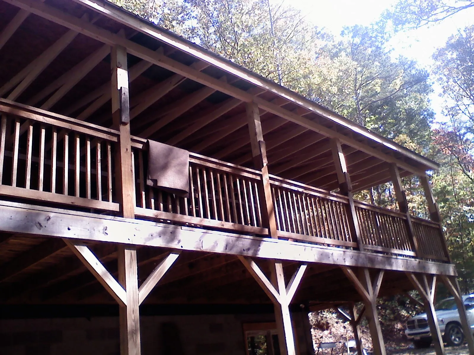 Timber framing under a new elevated porch and deck — Roof Leak Repair in Shasta by Roofing Brothers